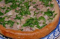 Pui la cuptor în "farfurie" de aluat